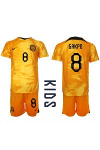 Alankomaat Cody Gakpo #8 Jalkapallovaatteet Lasten Kotipeliasu MM-kisat 2022 Lyhythihainen (+ Lyhyet housut)